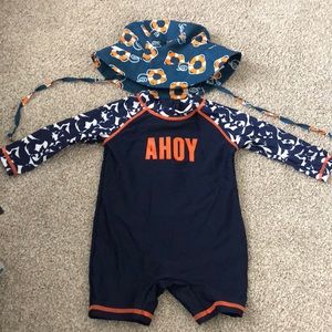 Long sleeve swim one piece with matching hat